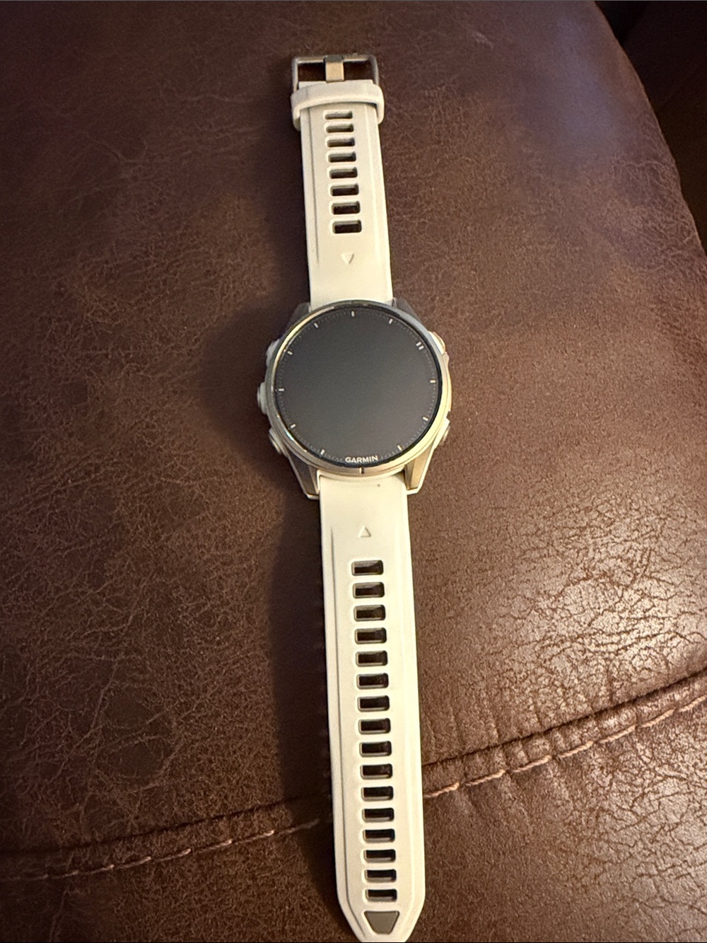 garmin white sport GPS smartwatch with silver bezel